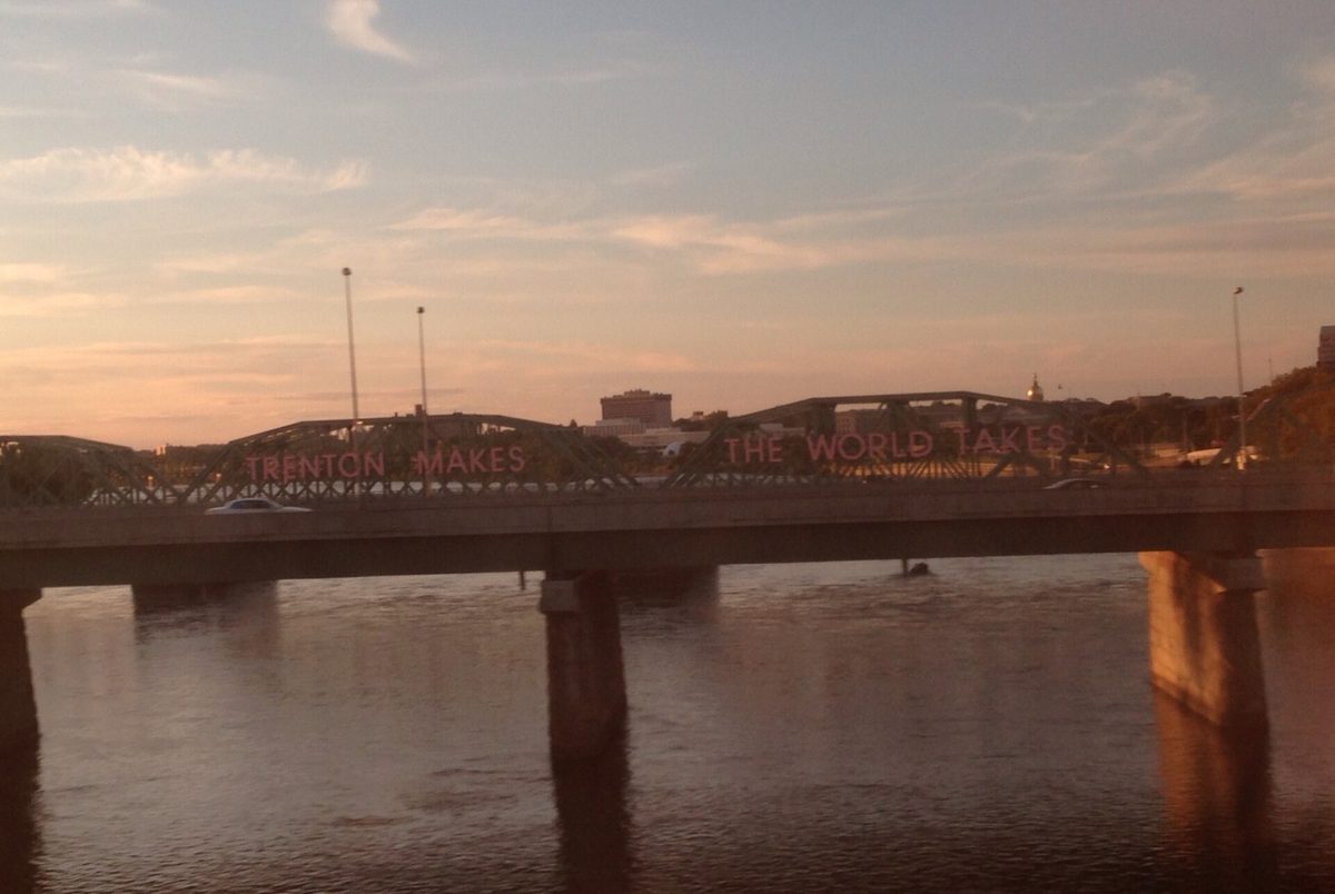 The Lower Trenton Bridge and its Trenton Makes The World Takes sign over the Delaware River